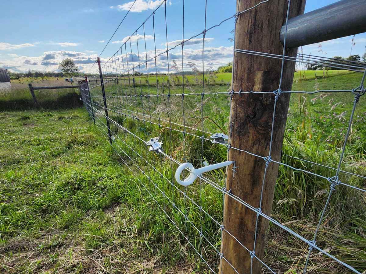 Fence with Woven wire fence installed in Madison Wisconsin around an agricultural property in Madison Wisconsin