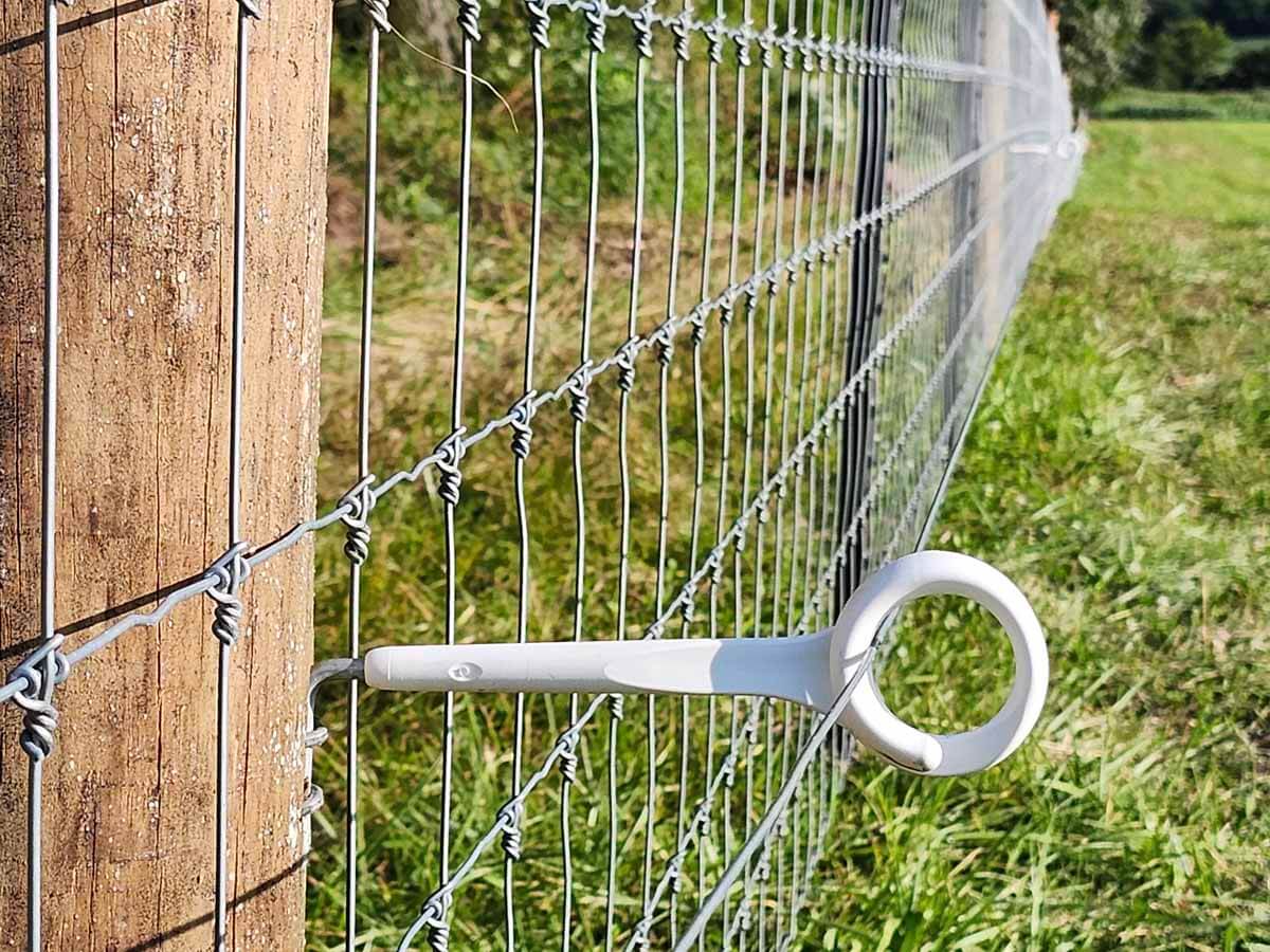 Fence with Woven wire fence installed in Madison Wisconsin around an agricultural property in Madison Wisconsin