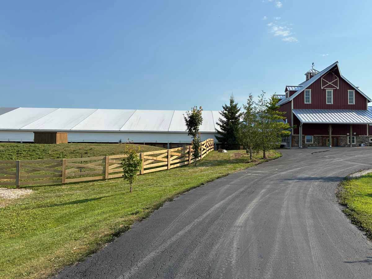 Fence with Crossbuck farm fence installed around a farming property in Madison Wisconsin in Madison Wisconsin