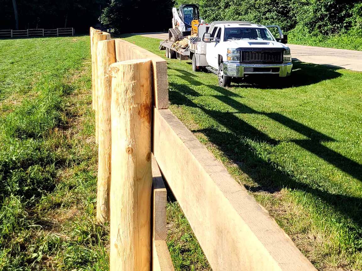 Fence with Wood Farming Fence in Linden Wisconsin in Madison Wisconsin