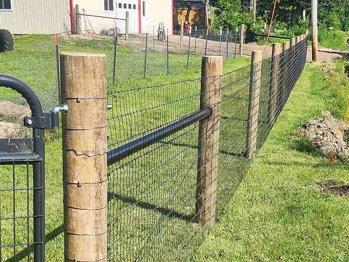 Fence with Woven Wire Farm Fence in Madison Wisconsin