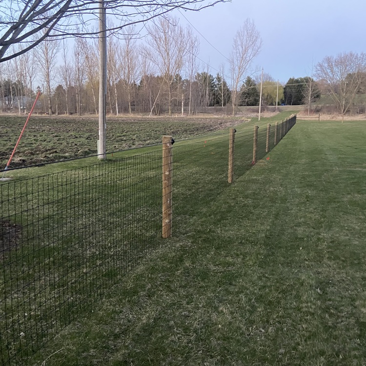 H&S crew installing fence in Beaver Dam, Wisconsin